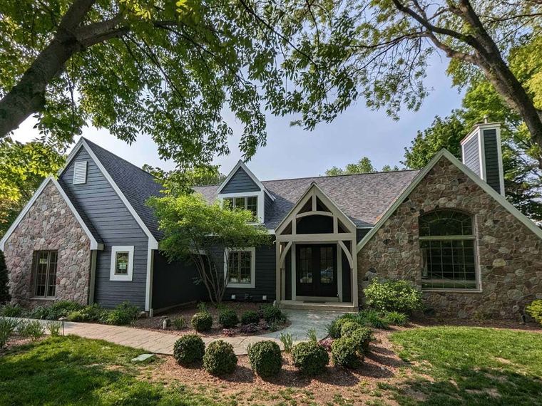 Completed stone and siding home exterior